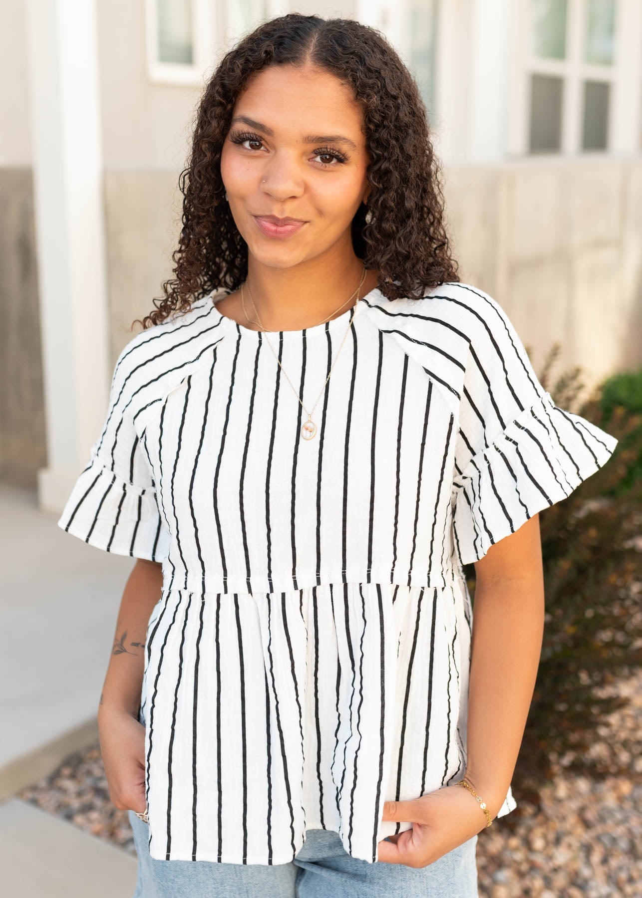 Brynn Black Striped Peplum Top